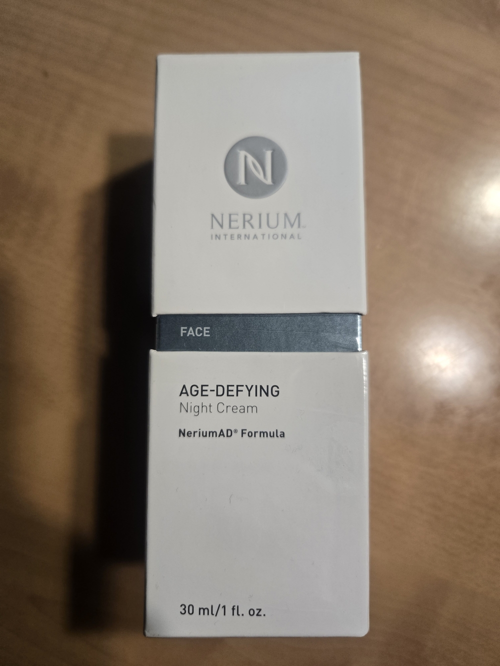 Nerium Age-Defying Night Cream in white with gray band